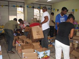 Image #14 - Hurricane Tomas Relief Effort (Packing the goods)